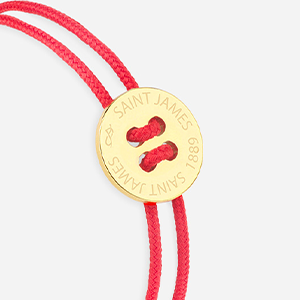 Bouton Saint James rouge plaqué or
