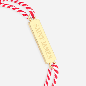 Logo Saint James rayé blanc et rouge plaqué or