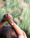 Portrait of a child in orange and silver plating
